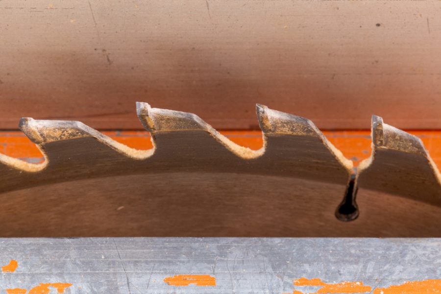 Close-up of circular saw blade teeth on a power saw, a tool part that may be examined in a product defect investigation